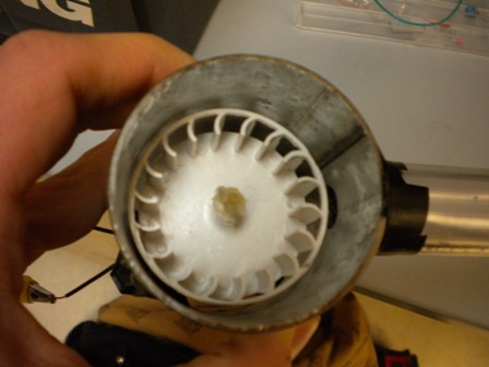 Close up image of fan wheel inside centrifugal fan housing.