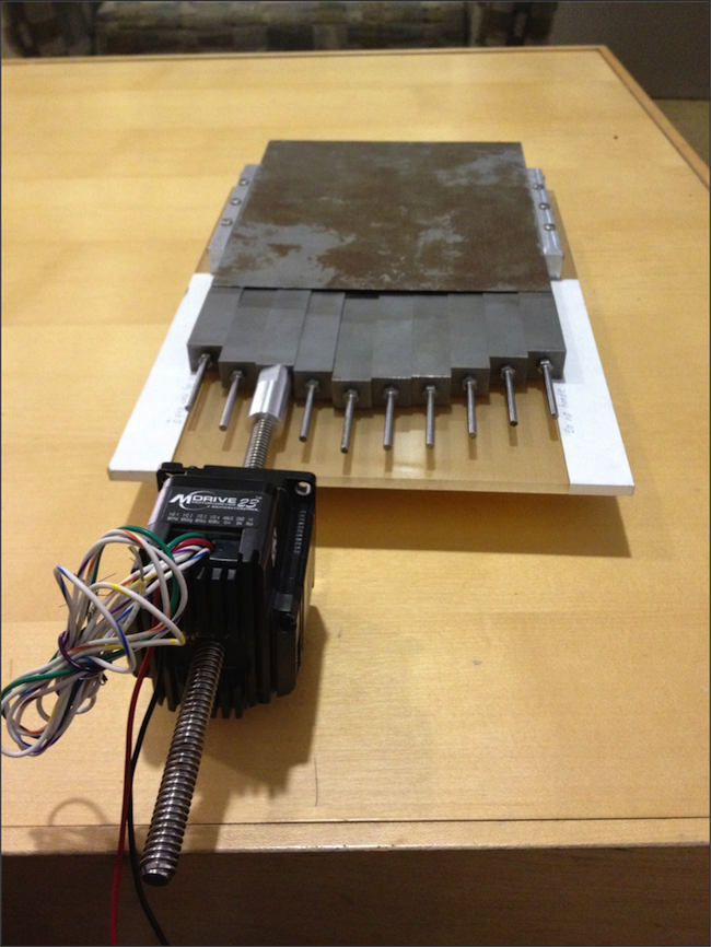 This is the final prototype that we utilized this semester.  The wedge is linearly actuated within a housing made of steel and plexiglass.  The actuation method is a linear stepper motor (MDrive 23 Plus) .