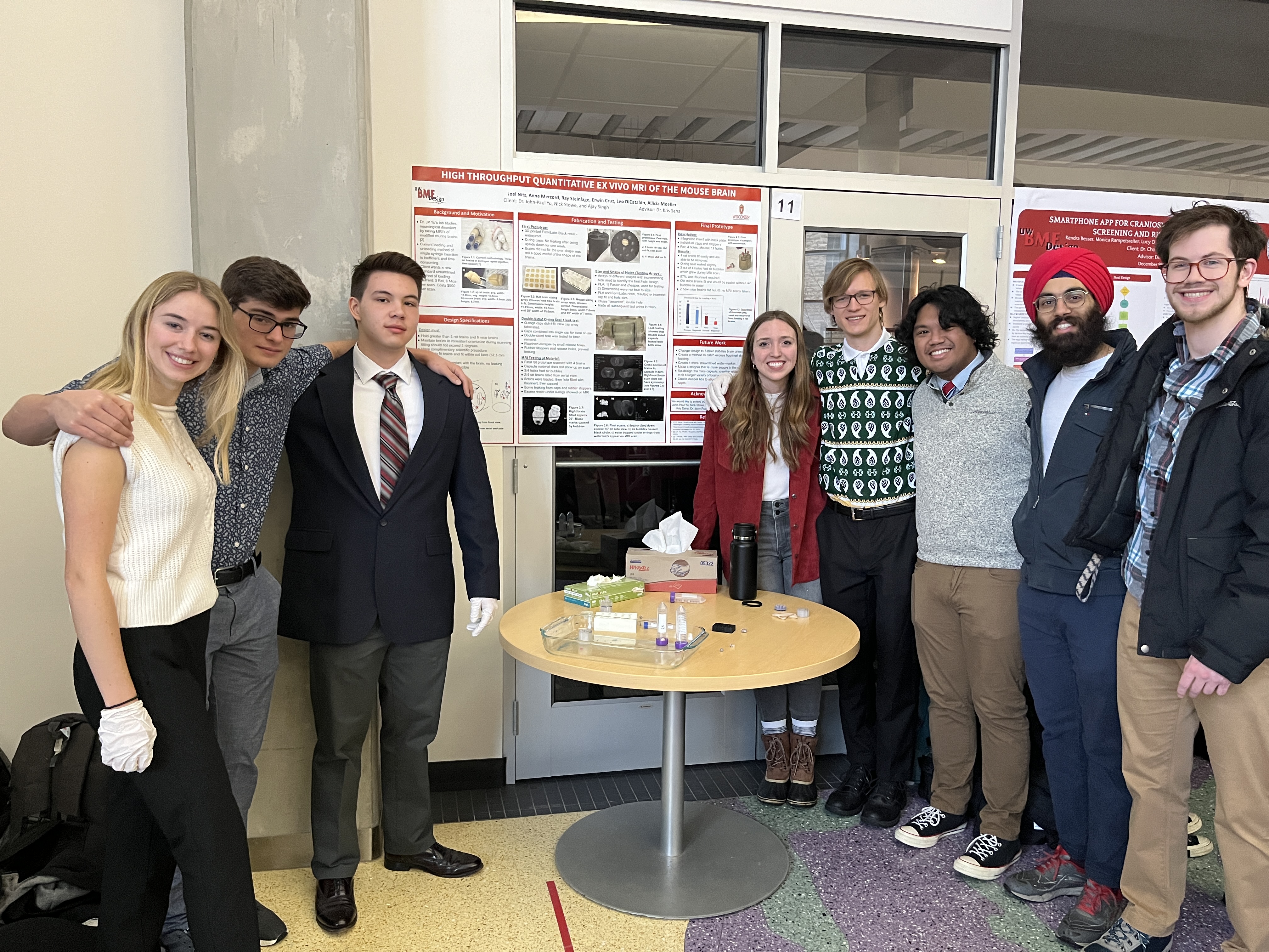 Poster presentation: (left to right) Allicia Moeller, Leonzio DiCataldo, Raymond Steinlage, Anna Mercord, Joel Nitz, Erwin Cruz, Ajay Singh (client), Nick Stowe (client)