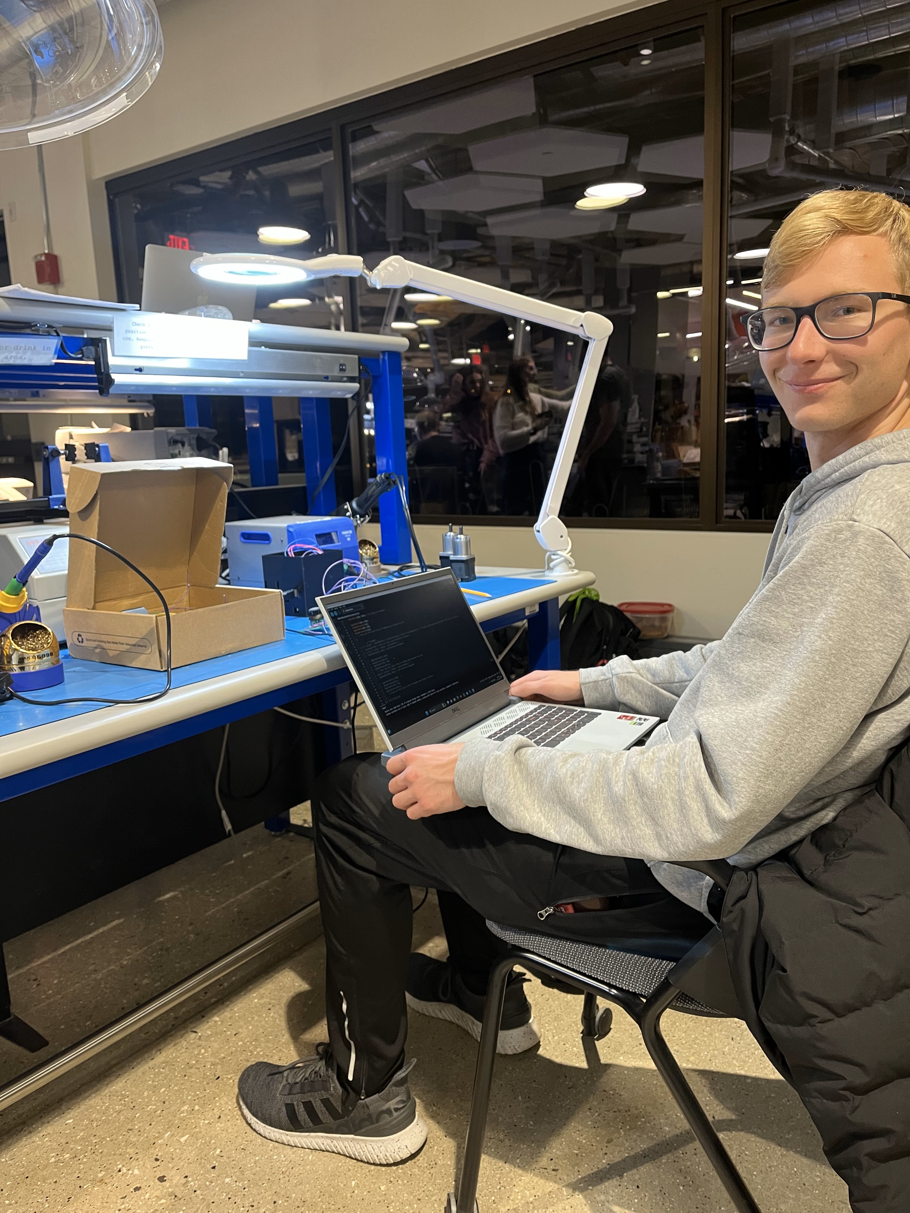 Nick working on software and electrical components for the stepper motors