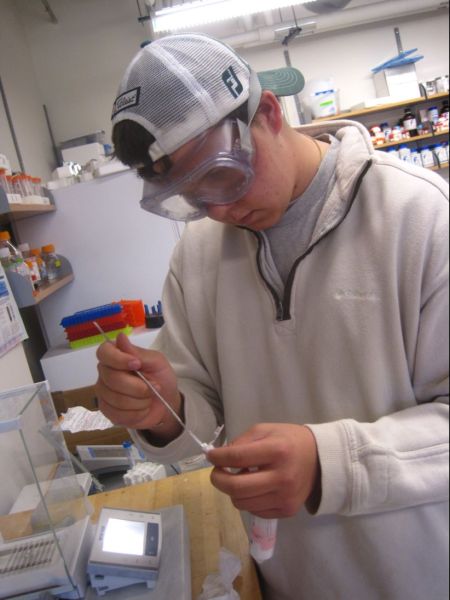 John is weighing out amount of PEG-DA to be used for the swelling testing