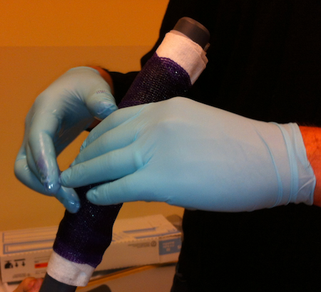 Dr. Halanski performng three-point mold casting procedure on preliminary prototype