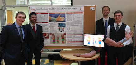 Team pictured with fully-functional prototype at BME Design Symposium