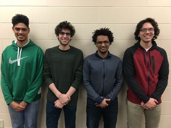 Team members from left to right: Carlos Veguilla, Yash Gokhale, Mengizem Tizale, Luke Hetue